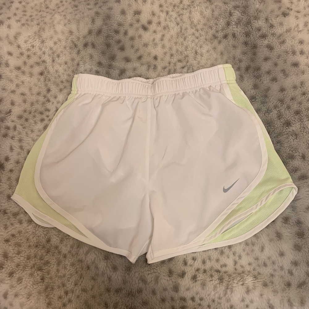 White Nike running shorts
